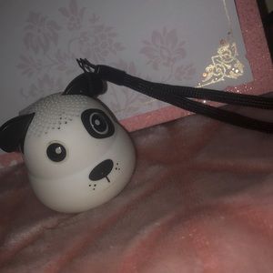 Black and white dog Bluetooth speaker